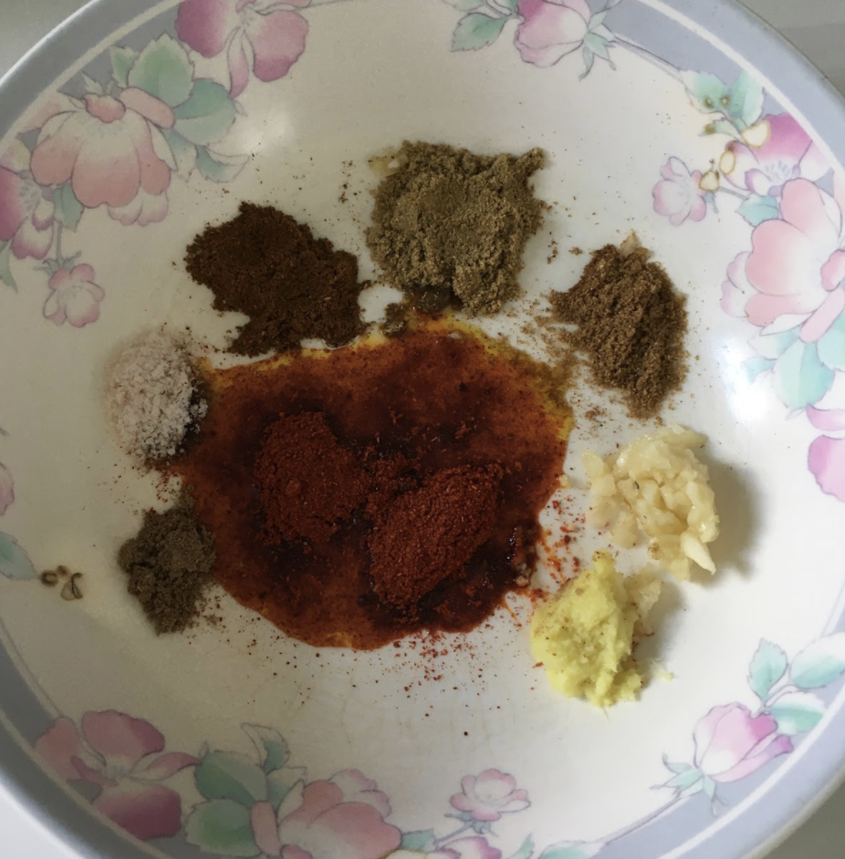    1-2tbsp mustard oil    1tbsp chili powder    1 tsp coriander powder    ½ tbsp cumin powder     1tsp Shilpa’s Masala Mill garam masala      ½ tsp amchur powder( mango )    ¼ tsp black pepper powder    1tbsp ginger garlic paste    ½ cup of thick curd( hung curd)    250 gms of paneer, cubes    1-2tbsp of roasted Besan    ½ tsp lemon juice    Salt to taste    Green chutney    Slices of Cheese ( optional)    4-6 slices of bread    1tbsp ghee( or oil)    Butter    1med Capsicum, cubed    1 medium onion, cubed    1medium tomato, cubed( reduce seeds )       INSTRUCTIONS     In a bowl, add mustard oil and all the powdered spices. Mix well    Now add the hung curd, ginger garlic paste, roasted besan, and lemon juice    Mix well until a smooth batter. Consistency should be thickish. ( if too thick add more yogurt, if too thin add more besan)    Add all the vegetables and paneer   