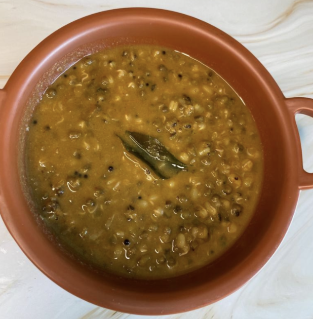 Muga Gathi or Mugache Gathi This is a traditional vegetarian Goan, Maharashtrian dish made with sprouted Moong. It is usually served in temples and made during religious festivals especially Ganesh Chaturthi. This vegan recipe is a no ginger, no garlic, no onion recipe and uses only 1 tbsp of oil. Simply delicious-and best enjoyed with Puris. INGREDIENTS FOR MOONG: 250 gms green Moong ( soaked and sprouted)