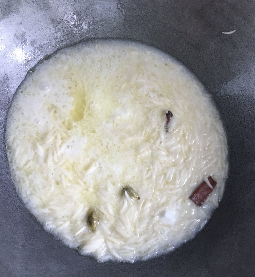 Cover and cook on low flame for about 10 mins ( until rice is 90 % cooked) Mix grated coconut and jaggery and add to the rice