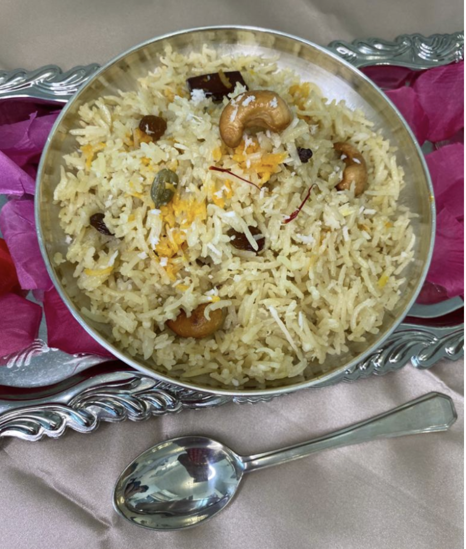 Serve garnished with nuts and fresh coconut