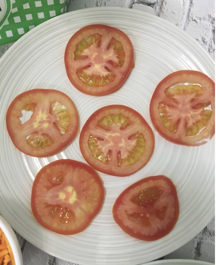 Lemon juice Mayonnaise Salt Sugar Black pepper Soya sauce Garlic powder 2large, thick bread slices INSTRUCTIONS: slice cucumbers and pat dry Slice tomatoes and pat dry Julienne carrots. Add salt, sugar, lemon juice, pepper, and little oil. Mix well