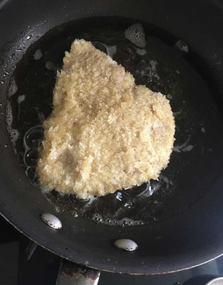 Chop up two boiled eggs. Add mayonnaise, mustard, sugar, salt, and pepper. Mix well