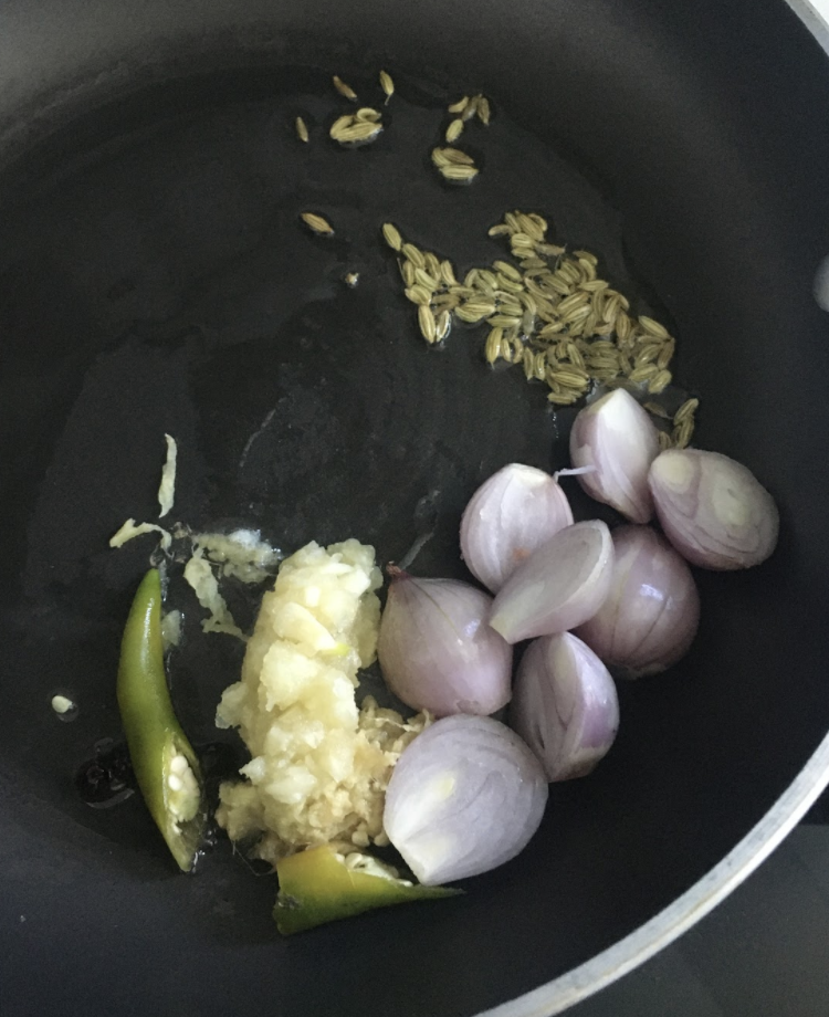 Preparing Coconut Masala