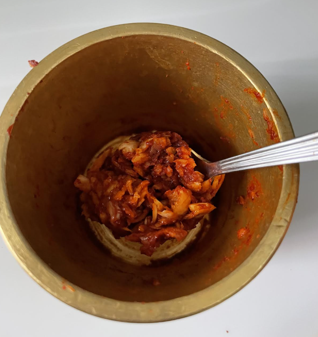 Adding garlic and chilli paste to papdi