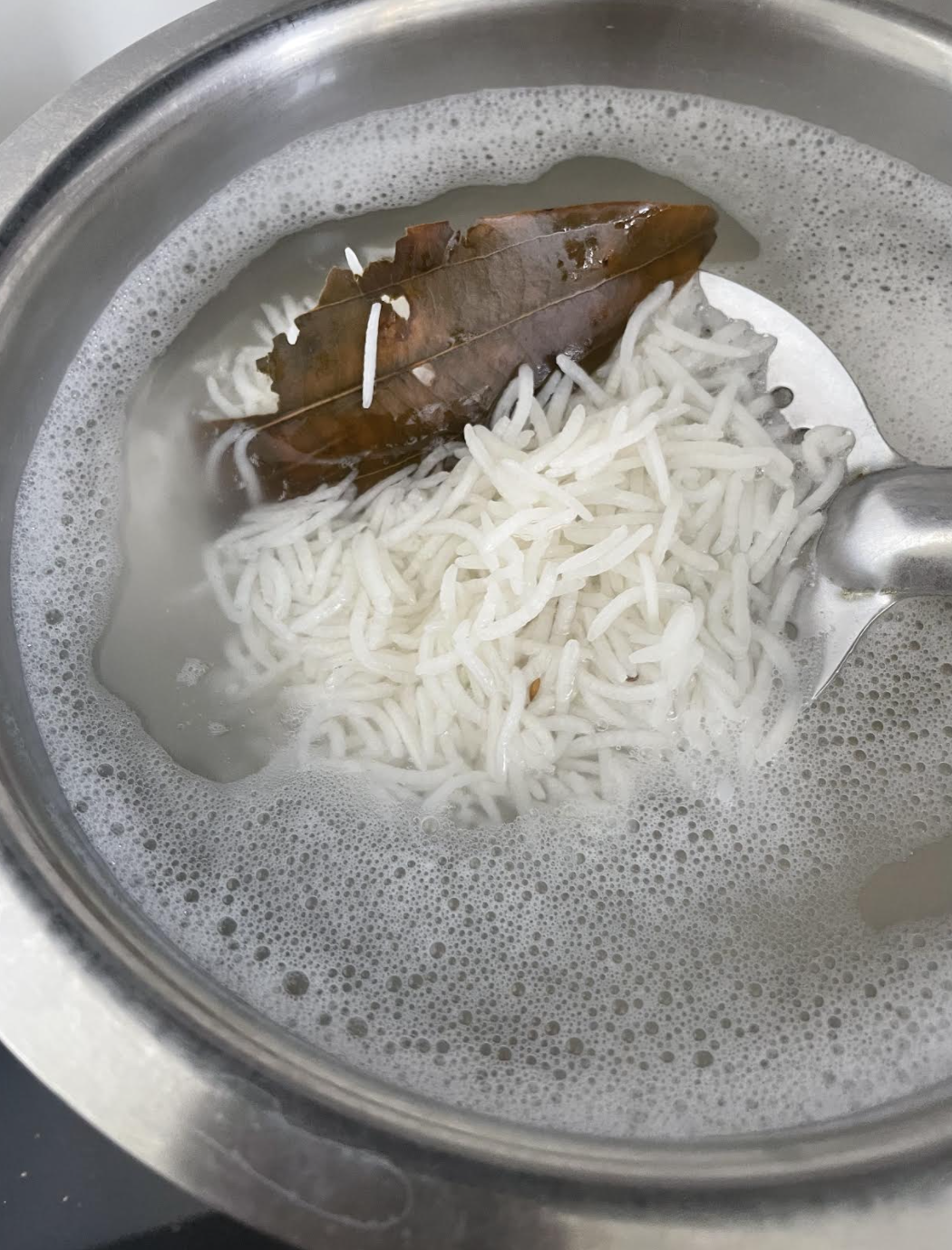 Layering chicken biryani