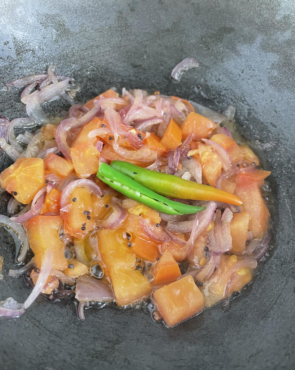 Adding Vegetables to Sambar