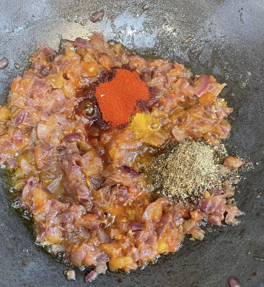 Cooking Achari Baingan