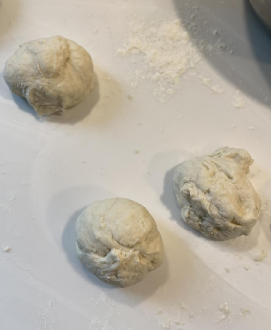 Rolling and topping Kulcha