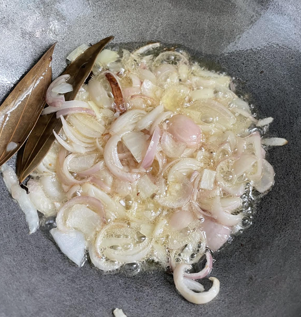 Add marinated prawns and mix gently