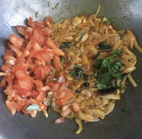 Adding Coconut Masala